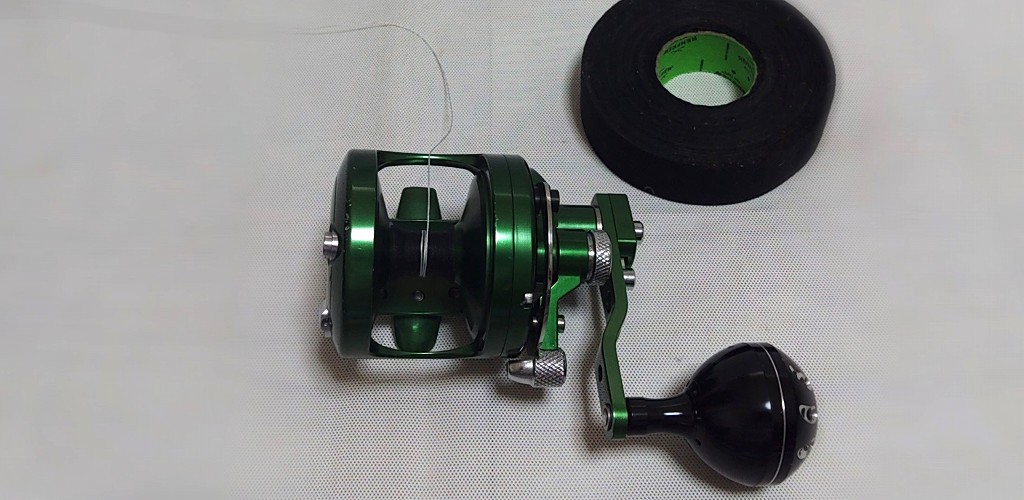 lever drag reel wrapped with hockey tape